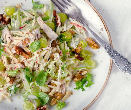 Fresh Salad with chicken, apples, celery, grapes.