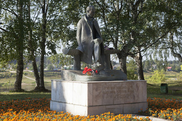 Monument to the poet Nikolai Mikhailovich Rubtsov on the river shore Sukhona in the town of Totma,...