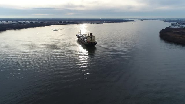 Aerial Footage of Tugboat Assisting Cargo Ship on Delaware River Philadelphia PA