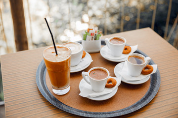 cup of coffee on a tray in cafe