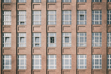 Old red brick industry building facade, Berlin, Germany, Europe, Vintage filtered style 