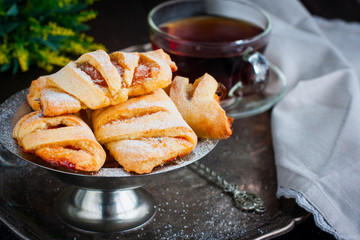 Baking of cottage cheese pastry with apricot jam, selective focus