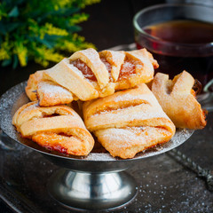 Baking of cottage cheese pastry with apricot jam, selective focus
