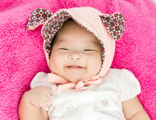 Portrait of adorable baby girl with hat