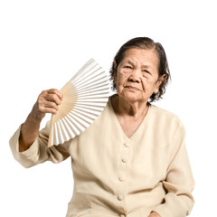 portrait of a senior woman with folding fan. Isolated on white b