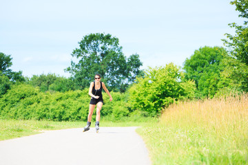 Young Woman With Inline Skates