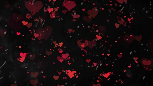 Valentinstag fallende Herzen hinter einer Glasscheibe mit Wassertropfen