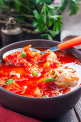 Chicken with tomatoes and red pepper, selective focus
