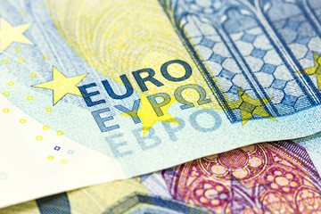some euro bank notes and coins
