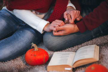 Guy and girl in the evening on the nature of romantic. Close-up  hands