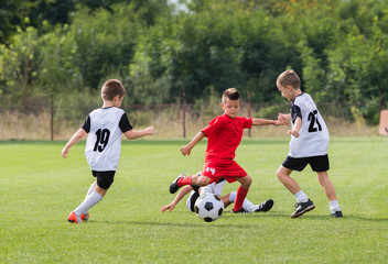  Boys kicking ball