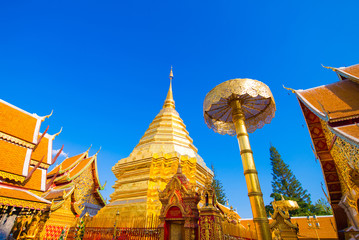 Fototapeta premium Most famous iconic of Chiangmai, Thailand. This is Wat Phra That Doi Suthep with blue sky during day time.