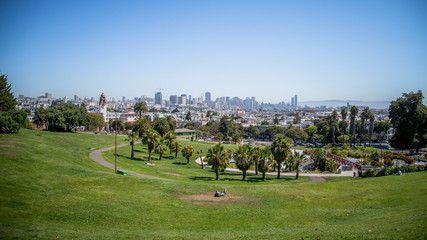 Fototapeta na wymiar San Francisco, CA, USA - July 25, 2014: Panorama of Dolores Park, with Downtown San Francisco in Background