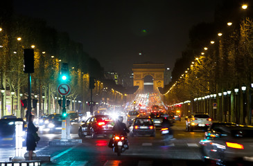 Fototapeta premium Night fires of cars on the Champs Elysee. Paris