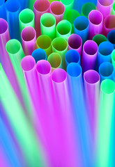 Closeup drinking straws of colorful tubes for cocktail pack