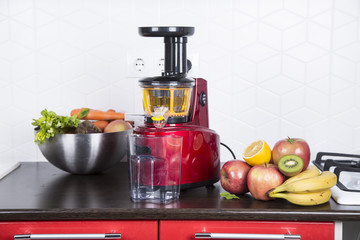 juicing fresh beautiful bright vegetables and fruits