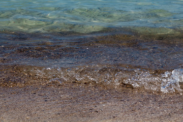 Transparent wave and sand