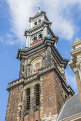 Fototapeta na wymiar Tower of the Westerkerk church in the center of Amsterdam
