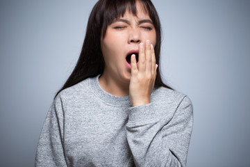 Woman yawning