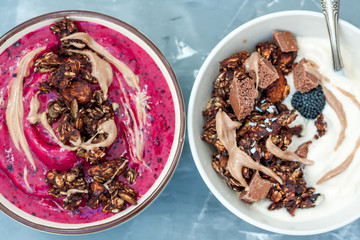 Smoothies bowls with chocolate muesli for a breakfast. Love for a healthy vegan food concept