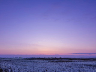 Beautiful evening sky and winter landscape