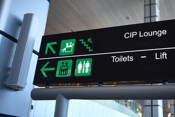 toilets and disable sign at airport