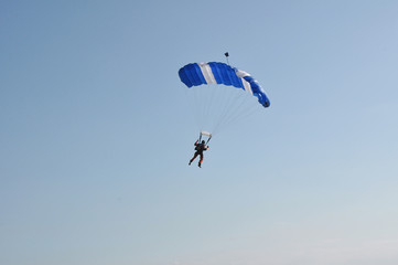parachute on blue sky background