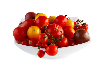 Yellow pea, cherry and plum tomato sorts isolated on white