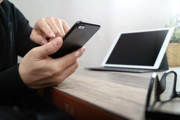 businessman hand using smart phone,mobile payments online shoppi