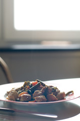 Chicken meat and vegetables on plate