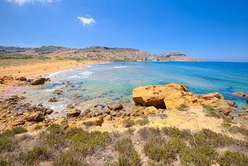 Fototapeta na wymiar The Ramla beach, Gozo, site of the legendary cave of Calypso