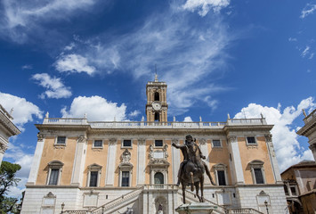 Fototapeta na wymiar Capitoline Hill in Rome with emperor Marcus Aurelius ancient bronze statue and beautiful clouds