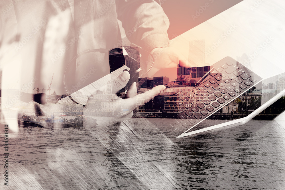 Poster double exposure of man hand using voip headset with digital tabl