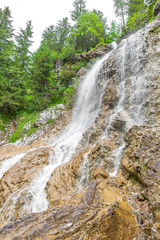 big waterfall in hinterstein (bavaria - germany)