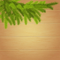 Christmas Wallpaper with spruce branches on the background of wo