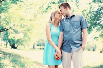 Naklejka premium Happy young couple in love together outdoors