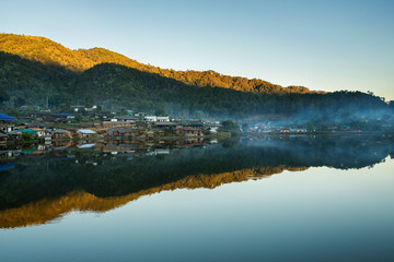Beautiful mountain village around the lake with reflection in Mae Hong Son,Thailand.