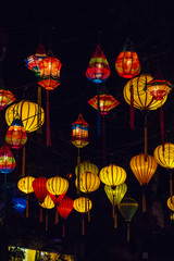 Colorful lanterns spread light on the old street of Hoi An Ancient Town - UNESCO World Heritage Site. Vietnam.