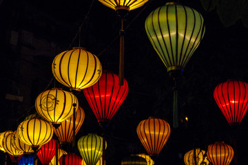 Colorful lanterns spread light on the old street of Hoi An Ancient Town - UNESCO World Heritage...