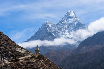 Tibetan stupa and Ama Dablam mountain peak, Everest region