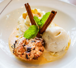 Oatmeal raisin cookies and ice cream on a plate,decoration of dessert.