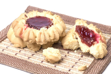 tasty little shortbread cookies with jam on the table
