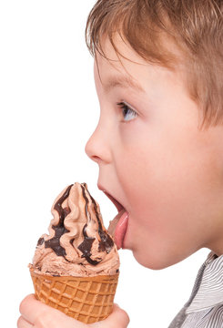 Portrait Of Cheerful Little Boy With Ice Cream Cone. Close-up Of Child Eating Ice-cream With Chocolate, Isolated On White Background.