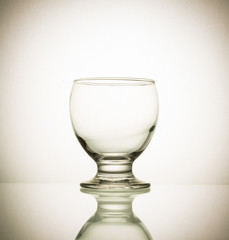 Closeup shot of empty crystal glass in retro style.