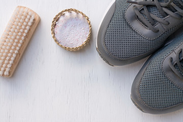 Cleaning shoes,washing the dirty sneakers at home, cleaning the shoes