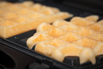  waffles are cooked in waffle iron