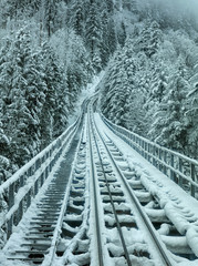Funicular railway in the Swiss Alps in winter