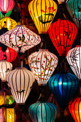 Colorful lanterns spread light on the old street of Hoi An Ancient Town - UNESCO World Heritage Site. Vietnam.