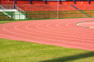 Fototapeta premium A stadium is a place for outdoor sports consists of a field or stage either partly or completely surrounded by a tiered structure designed to allow spectators to stand or sit and view the event.