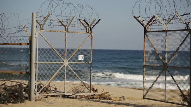Border fence on the shore of the Sea of Japan in South Korea
